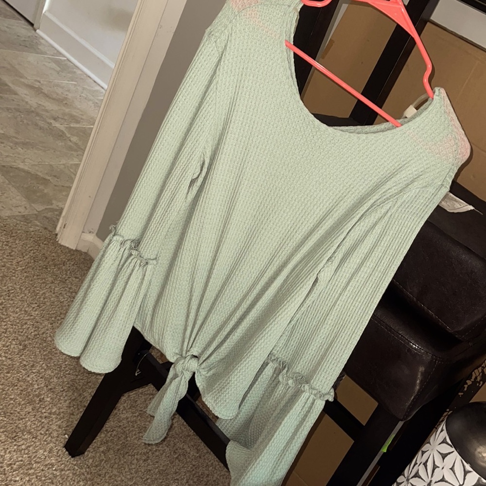 Never worn. Sea greenish blue color sweater/long sleeve